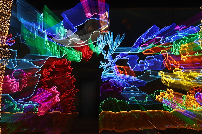 Abstract neon light installation with vivid multicolor streaks